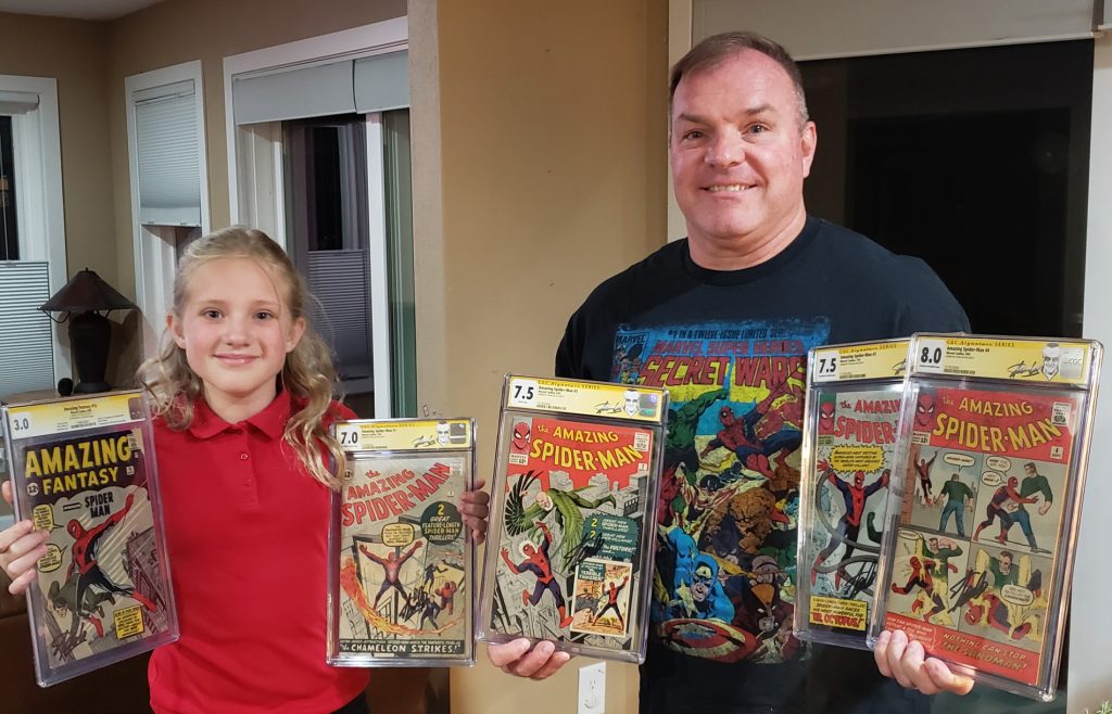 Mike Kowalske shows off some of this grail signed comics